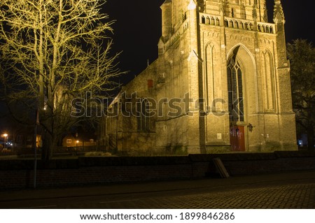 Entrance of the Sint-Maartenskerk church at night in Elst, Netherlands Stock photo © 