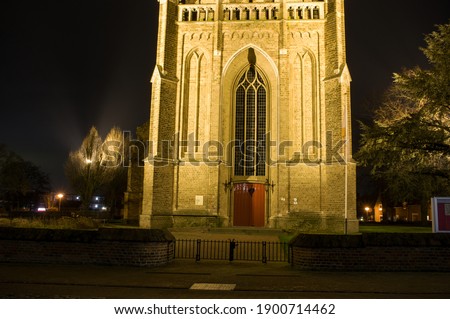 Entrance of the Sint-Maartenskerk church at night in Elst, Netherlands Stock photo © 