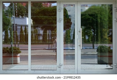 Entrance to a store or office. Gray entrance or office doors