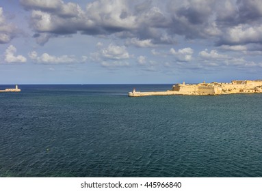 Entrance to the Valletta city harbor at Malta guarded by two lighthouses