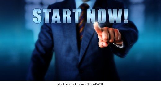 Entrepreneur is touching START NOW! on a virtual screen. Business metaphor and coaching concept for taking initiative, embracing change, advancing career, launching new business and goal setting.