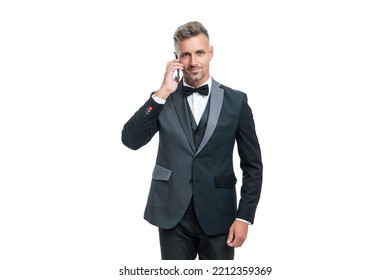 Entrepreneur In Tux Speaking On Smartphone Isolated On White Background