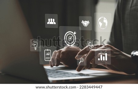 Entrepreneur type on keyboard for set business target with big data analytic for online marketing campaign that can increase sale revenue, reach to online marketplace customer. SEO concept