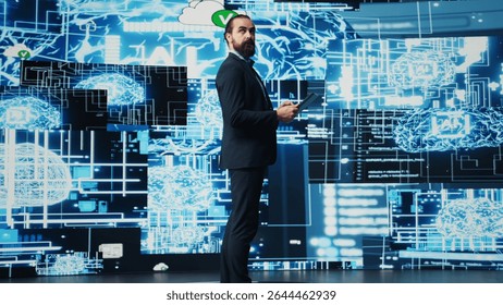 Entrepreneur uses laptop to review artificial intelligence brain system on dashboard, using high tech data visualization for coding, analytics and deep learning. Strategic growth. Camera B.