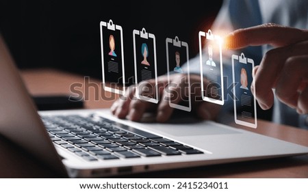 Entrepreneur using electronic devices for store customer data to gain customer insight in order to create marketing campaign that can help to increase sale and identify potential customer.