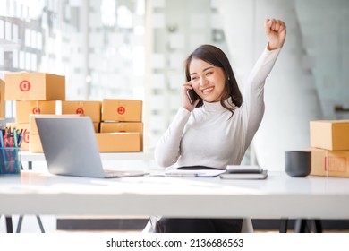 Entrepreneurs Small Business SME, Young Asian Women Happy After A New Order From The Customer, Business Owner Working At Home Office, Online Shopping SME Entrepreneur Or Freelance Working Concept.