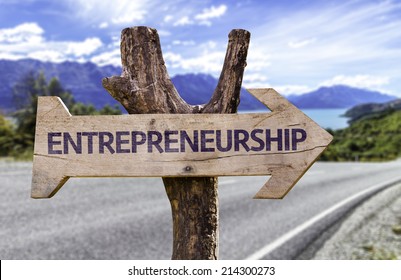 Entrepreneurship Wooden Sign With A Street Background 