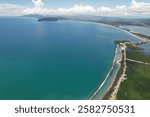 Entrop, Jayapura, Papua, Indonesia: the beauty view of hamadi beach, Tobati village, Enggros village, holtekamp beach in the midday, photo take from 500 meter above the sea level. (‎‎May ‎23, ‎2022)