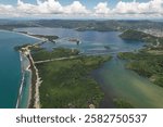 Entrop, Jayapura, Papua, Indonesia: the beauty view of hamadi beach, Tobati village, Enggros village, holtekamp beach in the midday, photo take from 500 meter above the sea level. (‎‎May ‎23, ‎2022)