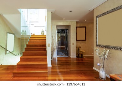 Entry with stairs and glass, parquet. No one inside - Shutterstock ID 1137654311