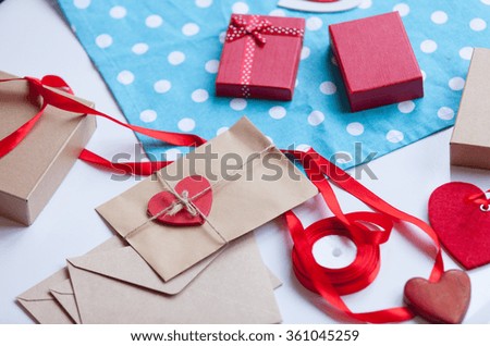 Similar – Foto Bild Weiße Geschenkbox mit Aufkleber auf Holztisch.