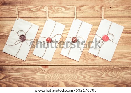 Similar – Image, Stock Photo Old paper envelopes over wood texture