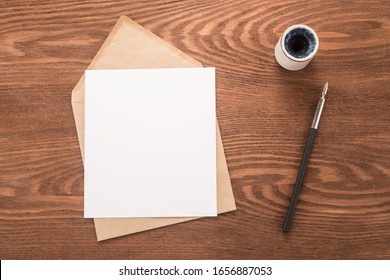 Envelope, ink pen, inkwell on a table	 - Shutterstock ID 1656887053