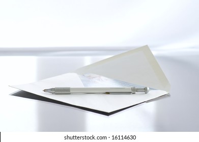 Envelope With The Letter On The Writing Desk Against The Bright Background