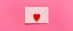 Envelope And Red Heart On Pink Background, Top View. Valentine's Day Celebration
