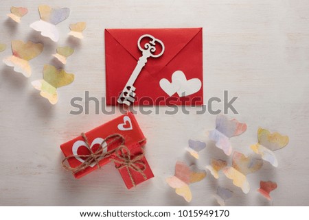 Envelope with sextets on a light texture with butterflies