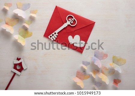 Envelope with sextets on a light texture with butterflies