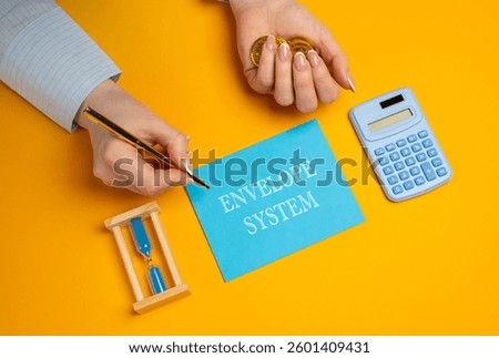 The Envelope System concept. Budgeting method that involves using physical envelopes to manage spending in different categories. Business and finance. A woman holds coins in hand, writes in a notebook