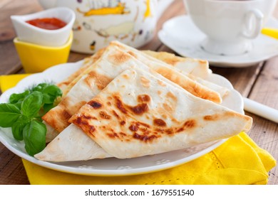 Envelopes In The Form Of A Triangle Of Pita Bread Stuffed With Cheese And Herbs, Selective Focus