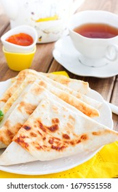 Envelopes In The Form Of A Triangle Of Pita Bread Stuffed With Cheese And Herbs, Selective Focus