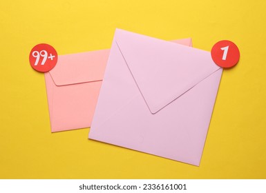 Envelopes with notification icons on yellow background - Powered by Shutterstock