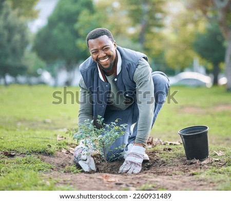 Environment, portrait and black man plant trees in park, garden and nature for sustainability. Community service, soil gardening and smile for volunteering, sustainable growth and happy green ecology