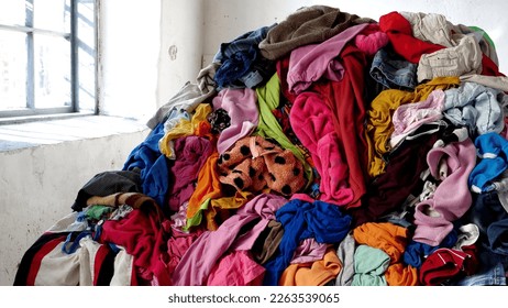 The environmental costs of fast fashion. The pollution, waste, and emissions of fast fashion, planetary crisis. High quality photo - Shutterstock ID 2263539065