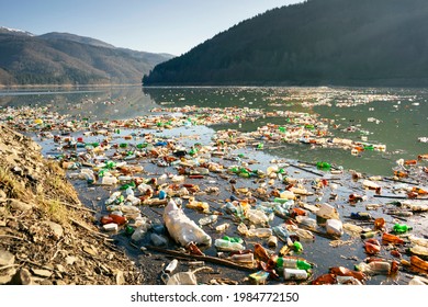Environmental disaster in Transcarpathia, Ukraine. Residents of mountain villages throw plastic waste directly into the rivers, which bring it to the reservoir and dump it on its banks. Low ecology.