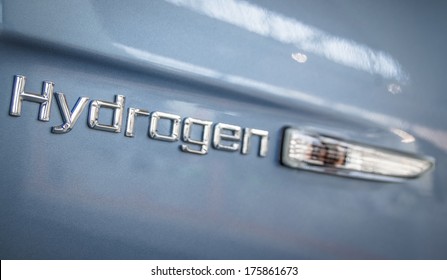 Environmental Energy Image Of The Sign On The Side Of A Modern Hydrogen Car