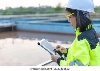 Environmental engineers work at wastewater treatment plants,Water supply engineering working at Water recycling plant for reuse - Shutterstock ID 2030895623