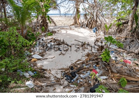 Environmental issue, Plastic pollution, massive amounts of plastic trash are washing ashore on beach of small island, Kayangel, Palau, Pacific