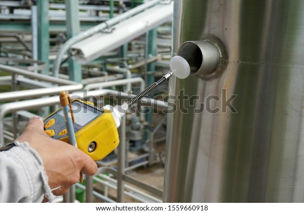 Environmental officer use chemical detectors to\
monitoring volatile organic compounds (VOCs) that is released from\
the valve is part of the prevention of environmental impacts at in\
factory.