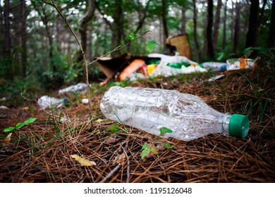 Environmental Pollution. G...bottles And Trash.
