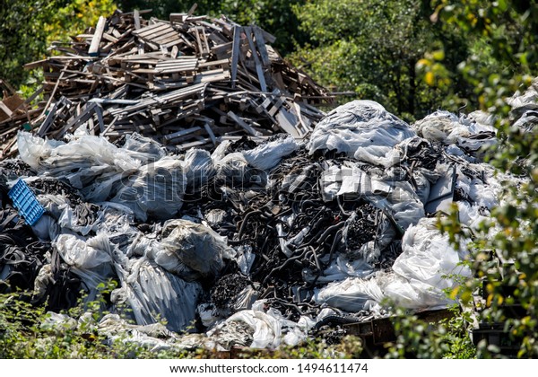  environmental pollution\
in nature, car and machinery parts and garbage thrown into the\
nature.