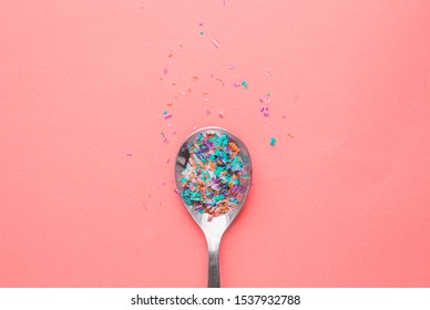 Environmental Pollution And Water Microplastic. Micro Plastic With Spoon