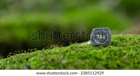 Environmental tax obligation, breaks concept. Green taxes icon nature view background.Using environmental  taxes, carbon tax, environmentally beneficial tax incentives to achieve environmental target.