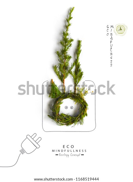 Environmentally friendly planet.Symbolic earth\
globe with pruces and trees, made of green grass and hand drawn\
cartoon sketches wire plug and socket in the globe. \
Green energy\
electricity\
concept.