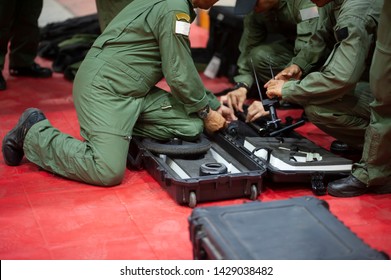 EOD solders prepare the equipment for bomb inspector  