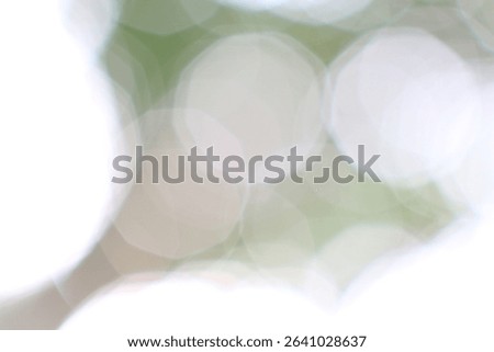 Ephemeral Dance of Light Abstract Background with Soft Green Hues