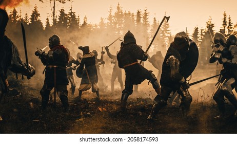 Epic Battlefield: Two Armored Medieval Knights Fighting with Swords. Dark Ages Army Warfare. Action Battle of Armored Warrior Soldiers, Killing Enemies. Cinematic Historical Reenactment.