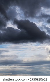 Epic dramatic Storm sky, dark grey and white cumulus clouds background texture