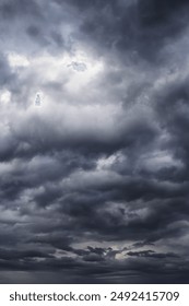 Epic Dramatic Storm sky with dark cumulus rainy clouds abstract background texture, thunderstorm