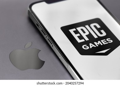 Epic Games Logo On Screen Smartphone IPhone With Apple Logo Closeup. Apple Is A Multinational Technology Company. Moscow, Russia -  August 25, 2021