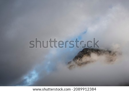 Similar – Summit in the fog