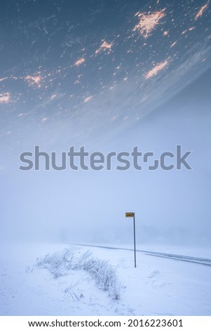 Epic scifi imaginery image of bus stop in fog in winter and a huge planet in the sky above the clouds. Some elements in the image furnished by NASA.