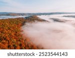 Epic Sunrise New England Fall Foliage Aerial View. Low Fog Over Vast Colorful Forest Trees. Poet