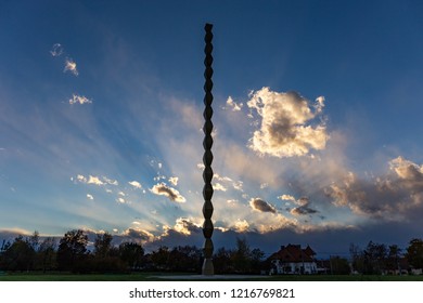 Epic view of the Constantin Brancusi's Infinity Column in the sunset.