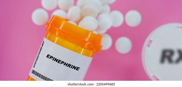 Epinephrine Rx Medicine Pills In Plactic Vial With Tablets. Pills Spilling   From Yellow Container On Pink Background.