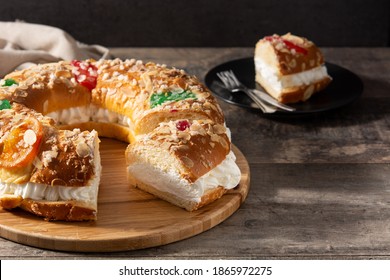 Epiphany cake "Roscon de Reyes" on wooden table
