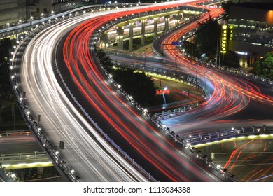 The Epitome Of The Bustling City, The Delay Freeway Scene Of The Shooting, Red And White Intersecting Road